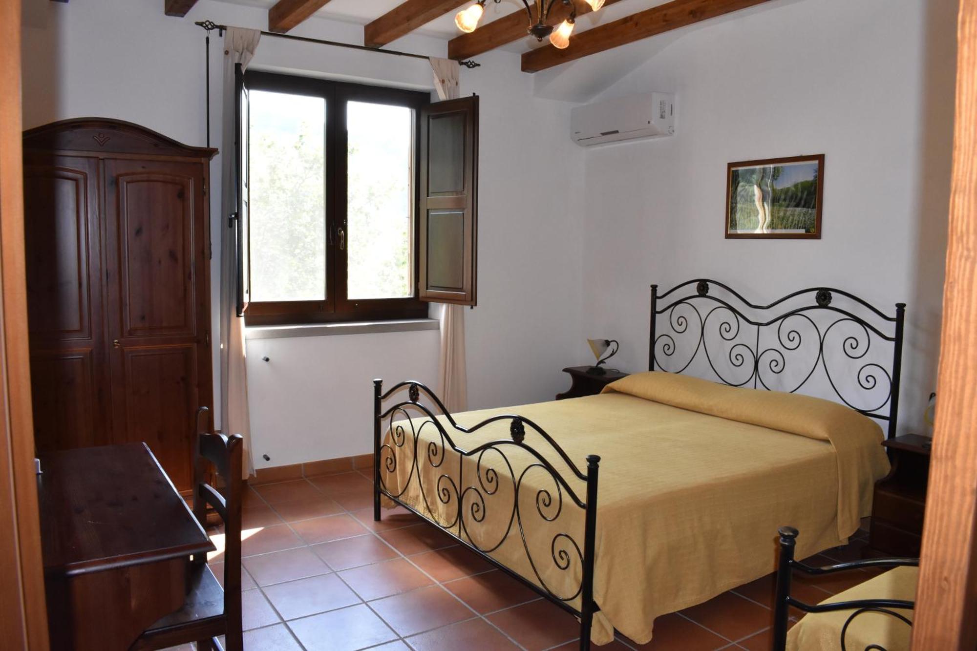 Camera Tripla con Bagno in Comune